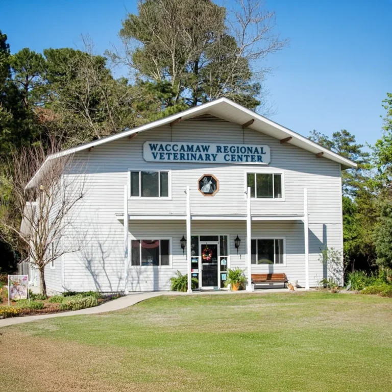 Full front view of Waccamaw Regional Veterinary Center with its sign, entrance, and surrounding greenery.